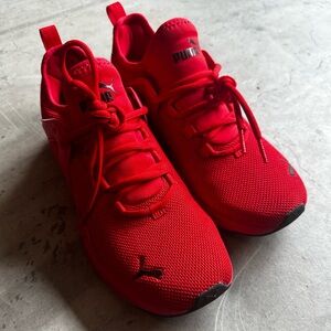 Red puma tennis shoes